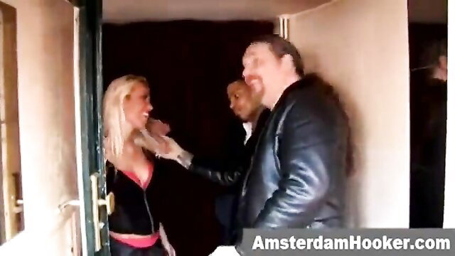 Blonde Dutch hooker grabbed by client in Amsterdam doorway BJ tease