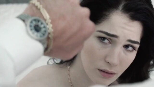 Evelyn Claire closeup shocked face as hand grabs her in bed hardcore