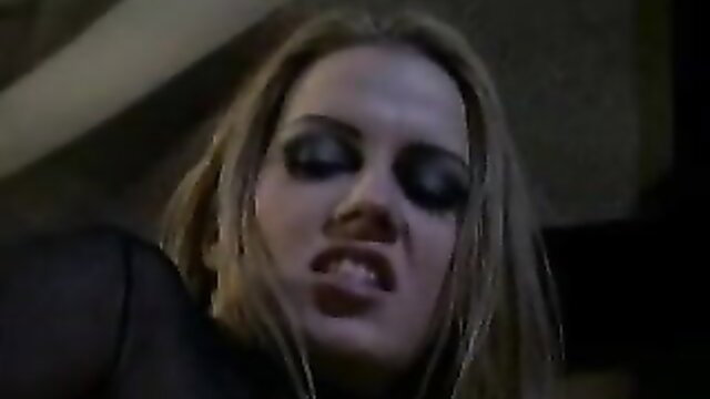 Inari Vachs intense closeup in lesbian scene from Bedroom Eyes