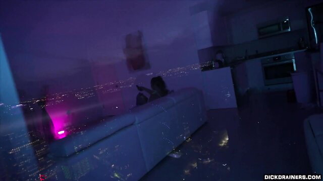 Carmela Clutch DD in neon-lit POV room scene