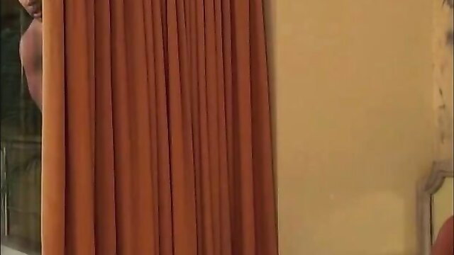 Ebony Brazilian bent over orange curtains, nude ass exposed, hardcore tease