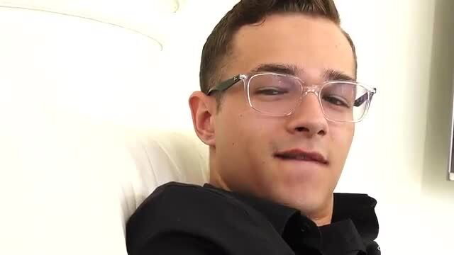 Natalie Mars in glasses smirking in black shirt, sexy transgirl thumbnail