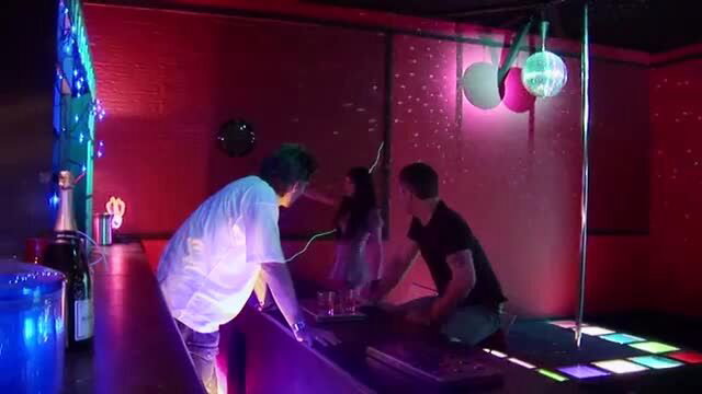 Hot policewoman in threesome at neon bar with two guys