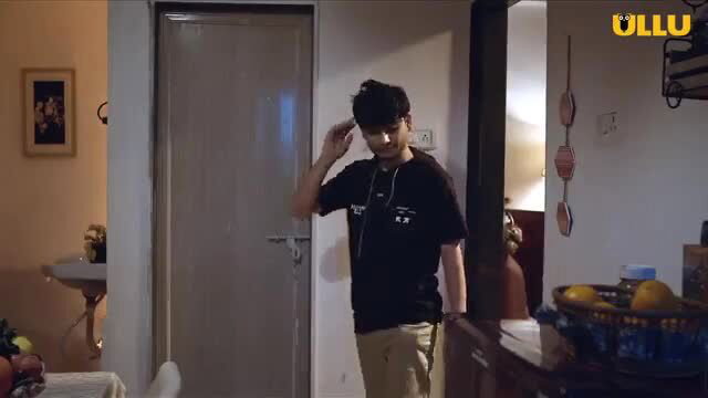 Horny Indian guy scratching head in tight tee, seductive pose