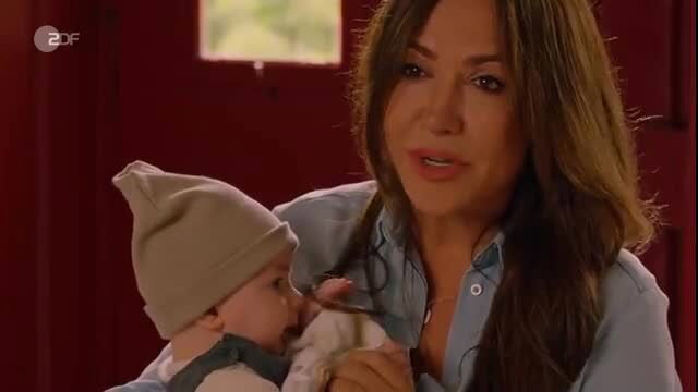 Carolin Hartmann lactating tits with baby in arms scene