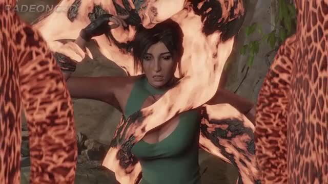 Lara Croft surrounded by flames in tight green dress, Tomb Raider cosplay
