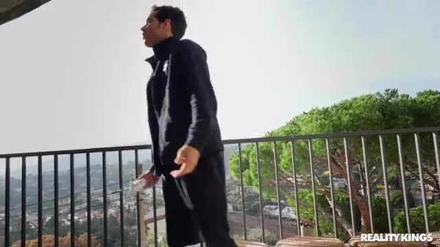 Misha Maver spied on by Alberto Blanco on balcony in tight black tracksuit