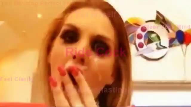 Blonde sissy with glossy red lips in shocked O-face closeup