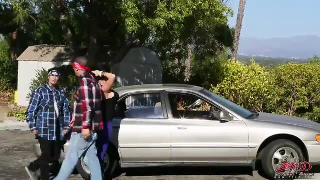 Sophie Dee nude with two guys stroking cocks on couch