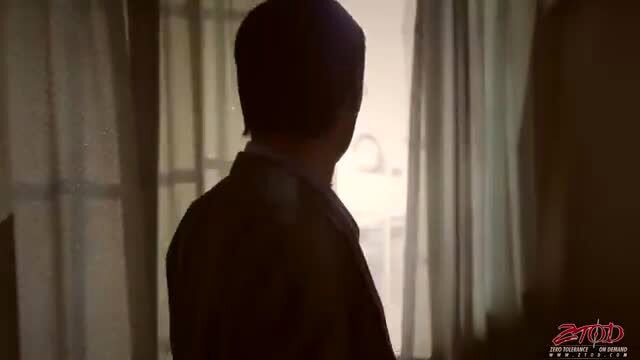 Silhouetted man in suit by window in Preston's Passionate Playground