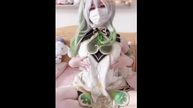 SweetRabbit233 as slutty green-haired Asian cosplay girl exposing pussy on bed