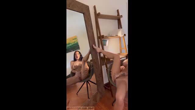 Asa Akira strips naked, spreads legs showing shaved pussy in mirror