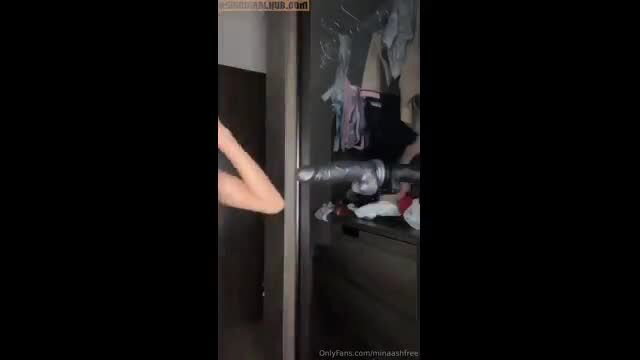 Mina Ash inserts black dildo into juicy pussy closeup