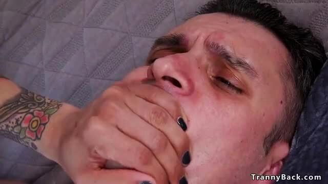 Foxxy TS handgags peeping tom in bed, intense face closeup