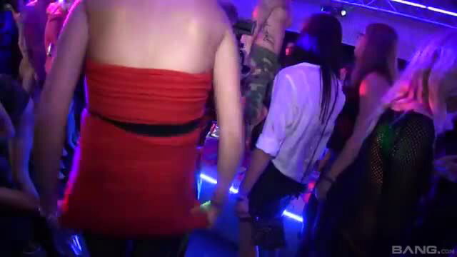 Wild girls in club pleasuring lucky guys with hands on bulges