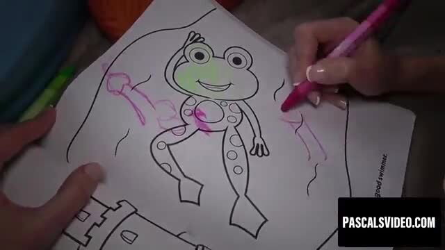 Dee Williams coloring frog on kids page in British dom sub scene
