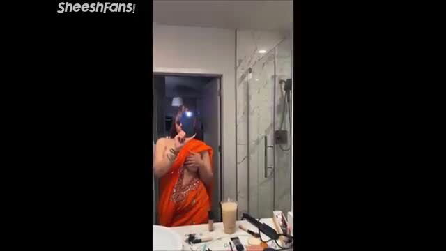 Divaflawless drops nude tits from orange saree in bathroom mirror selfie