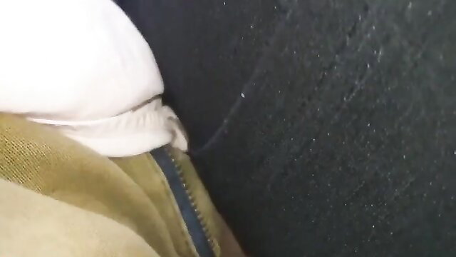 Encoxada grope: man gropes woman's ass from behind in tight space