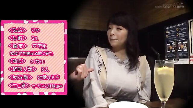 Japanese mature woman 21 in frilly dress sipping champagne at table