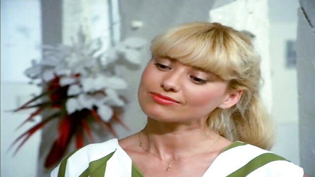 Odette Burel blonde bombshell in green top, French Satisfaction 1983