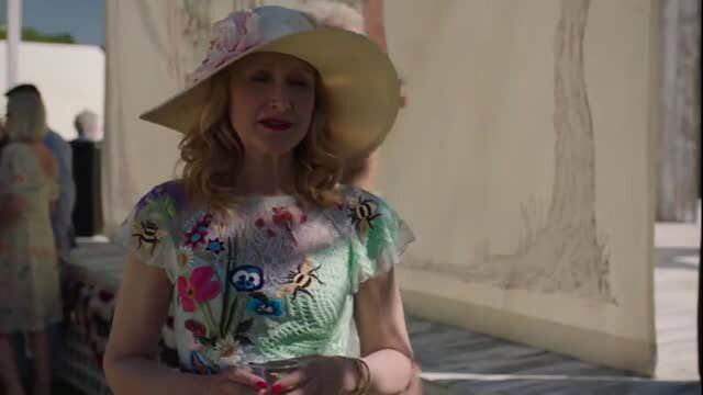 Hot Sexy MILF in floral dress and wide hat at outdoor event