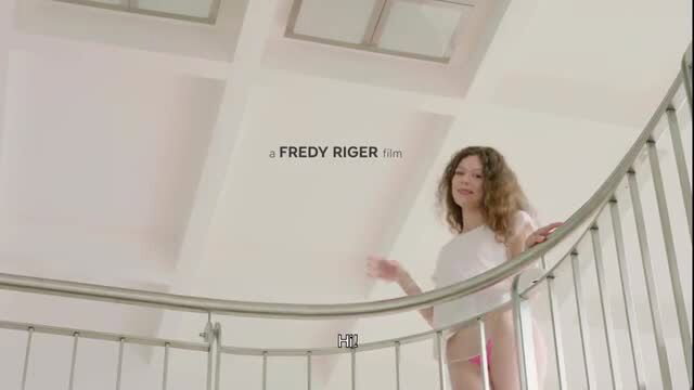 Sofi Smile in tiny white tee and pink thong on spiral stairs