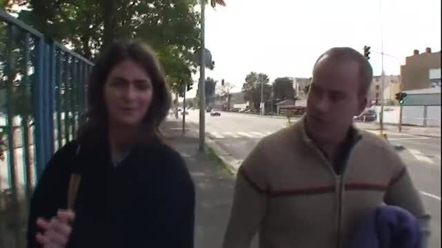 Charlotta Phillip walking outdoors with man, casual clothes