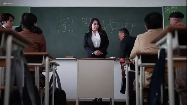 Busty Japanese teacher Yumi Kazama in classroom with adult students