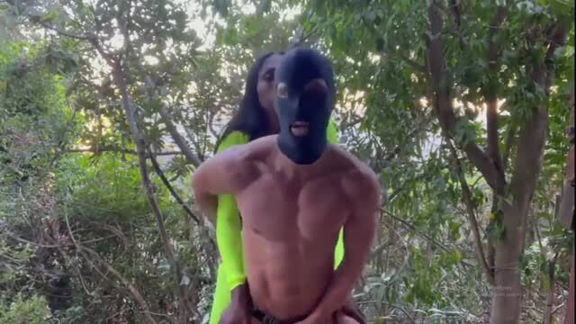 Kourtney Dash black tgirl in neon green rides masked white stud outdoors