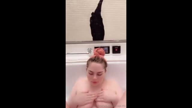 Linnea's Life busty blonde in bubble bath covering huge tits