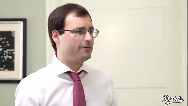 Melissa Lauren in suit and tie, professional tease