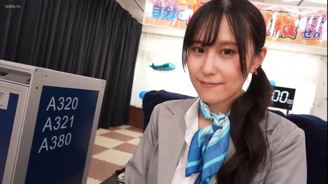 Japanese flight attendant at check-in counter in uniform