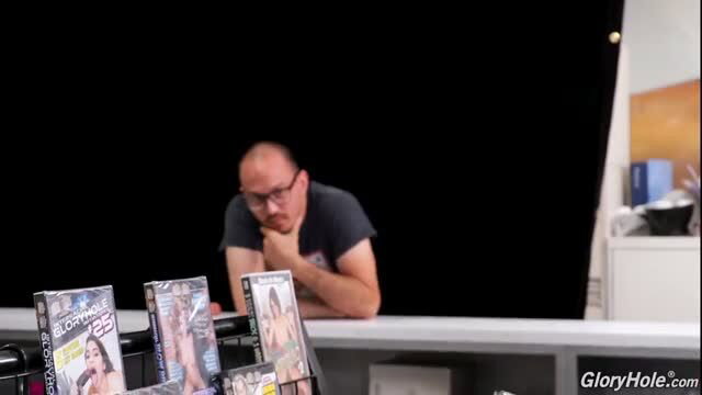 Sydnee Capri at gloryhole DVD stand, Gloryhole Secrets Double Trouble