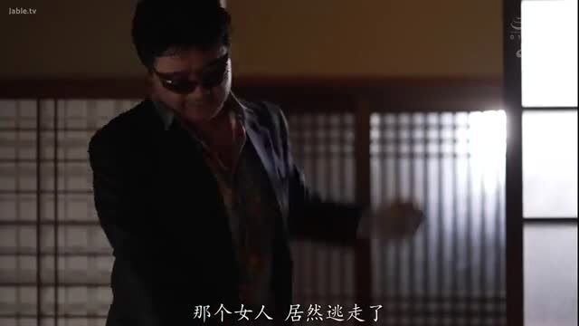 Akari Niimura in suit with shades in JAV scene