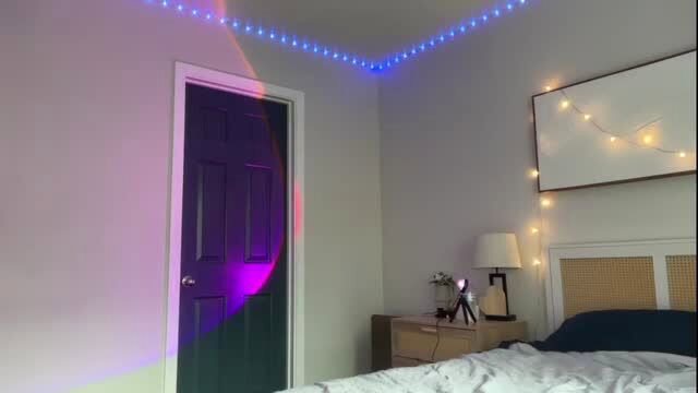 brianaboo's neon-lit bedroom with blue LED lights and cozy bed setup