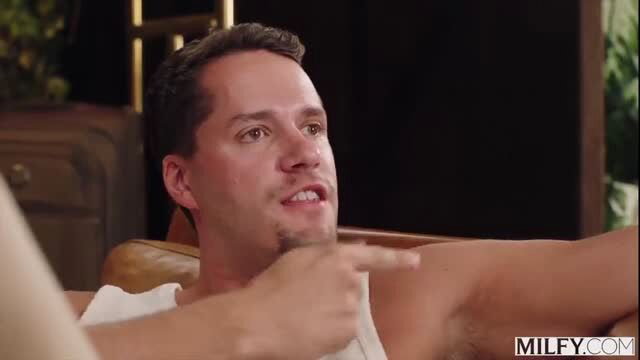 Sophia Locke with male performer pointing in intense MILFY scene