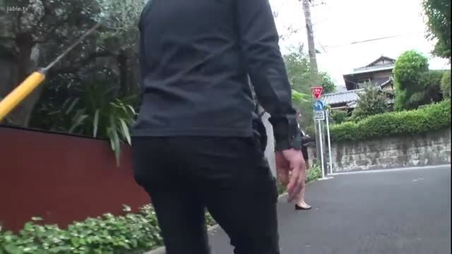 Japanese real estate agent in tight pants walking with man, big ass view