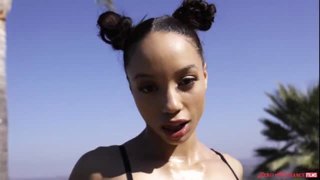 Ebony Pearl in pigtails licks lips outdoor tease Zero Tolerance