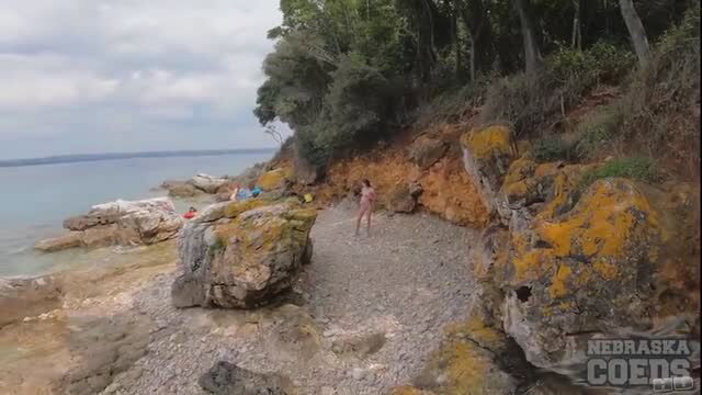 Nude teen hotties Cheri and Rebeka on rocky beach, steamy lesbo vibes