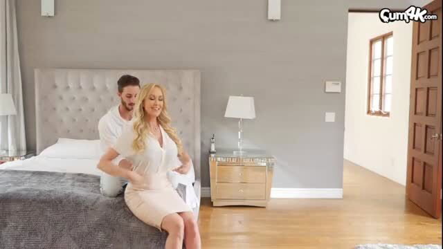 Brandi Love in white blouse and skirt on bed with Lucas Frost