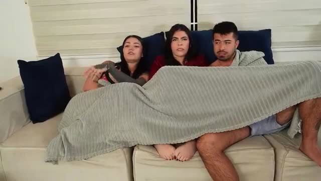 Big tits Latina sisters sharing blanket with guy on couch amateur tease