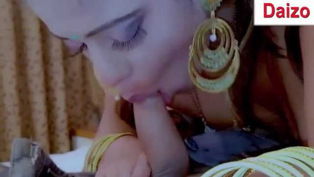 Closeup of seductive Indian wife Srimoyee licking finger in bed, big tits