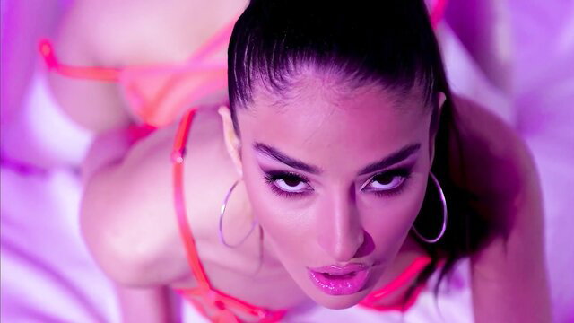 Emily Willis in sexy pink lingerie, seductive closeup pose