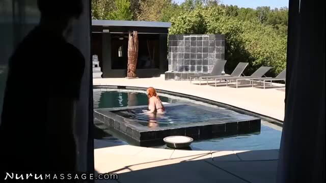 Britney Amber busty redhead in pool at Nuru Massage