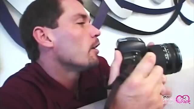 Tera Patrick puckers lips holding camera in sexy tease