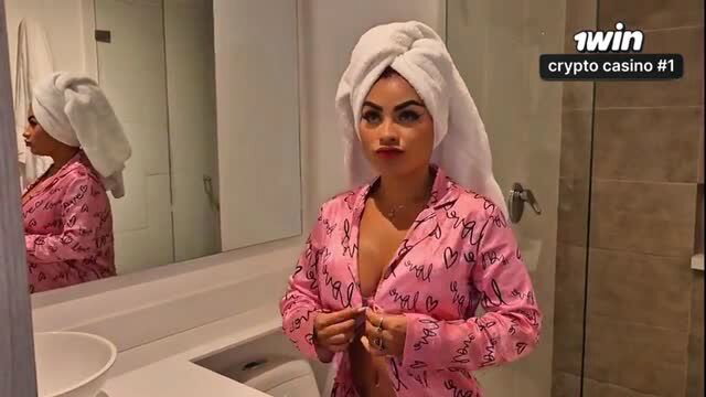Alejandra Palacios in pink robe and towel, sexy bathroom tease