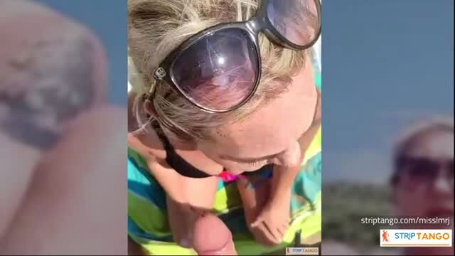 Blonde amateur in bikini licks cock POV beach cam show