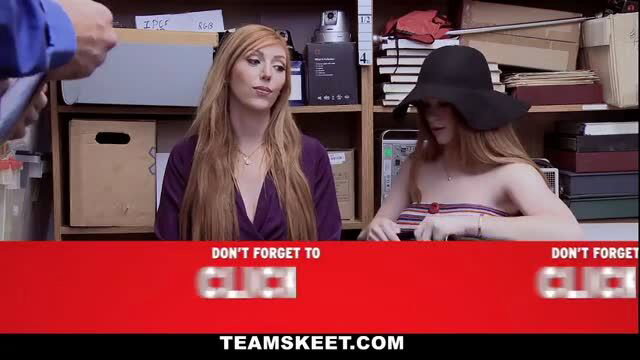 Two redhead beauties in purple top and striped bikini at desk in Case No. 8452728