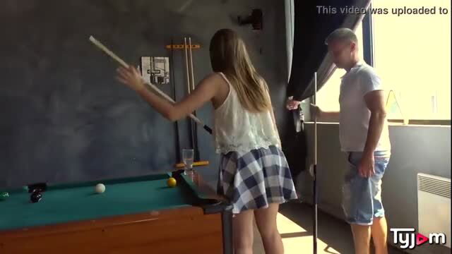 Lady Bug in plaid miniskirt bending over pool table thumbnail