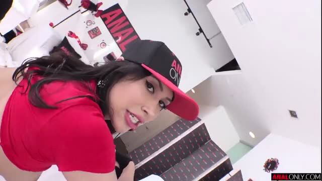 Penelope Woods in red top and ANAL hat, bent over teasing ass